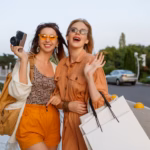 elegant-women-after-exiting-trip-shopping-posing-outdoor-near-airport_273443-1492